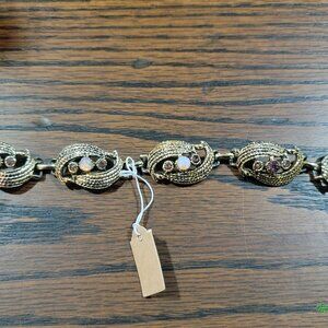 Gold Painted Costume Bracelet with Purple Stones and Faux Pearl Detail